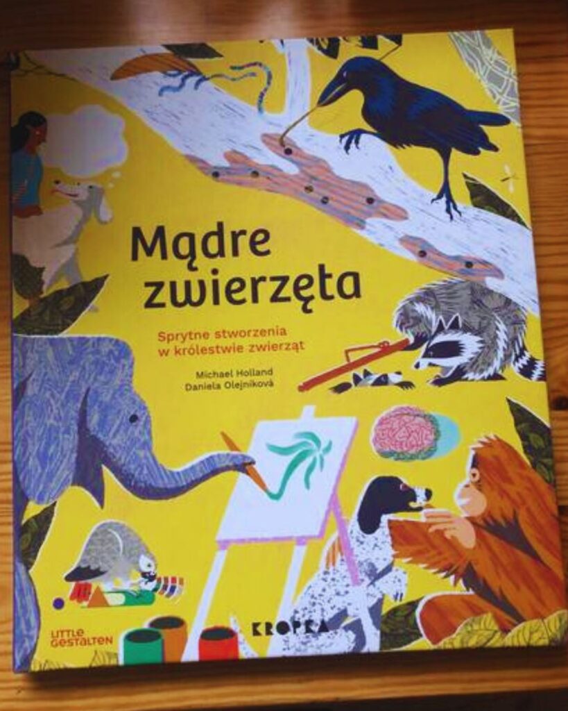 Okładka książki „Mądre zwierzęta. Sprytne stworzenia w królestwie zwierząt” – Michael Holland, Daniela Olejníková.